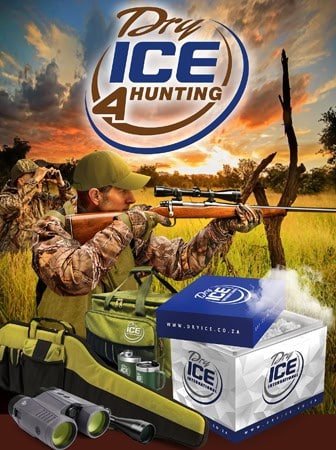 Hunter using a rifle with dry ice cooler for hunting at sunset.